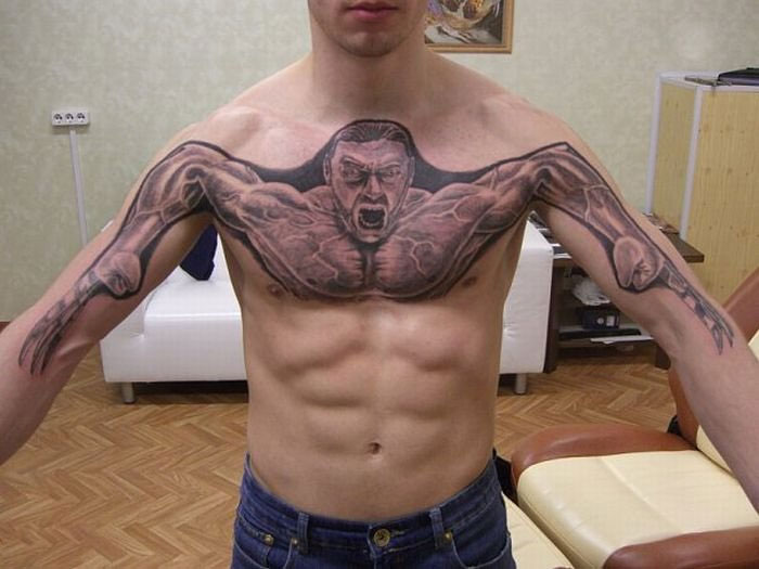 extremely bad tattoos - terrible chest tattoo