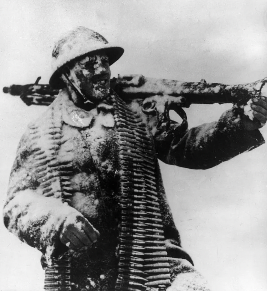 French soldier with a captured Mg42, the Alpine front in 1944.