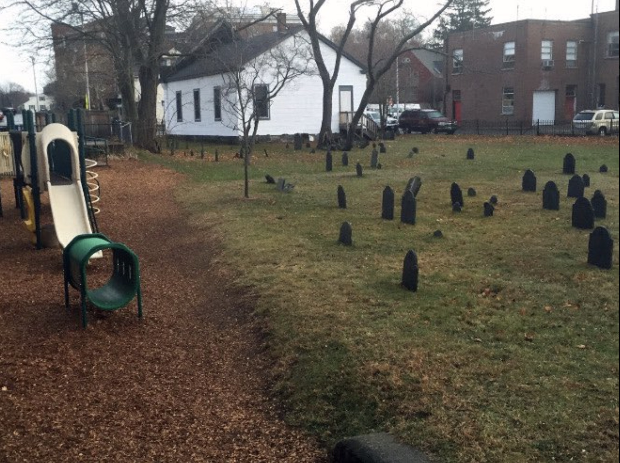 playground next to cemetery