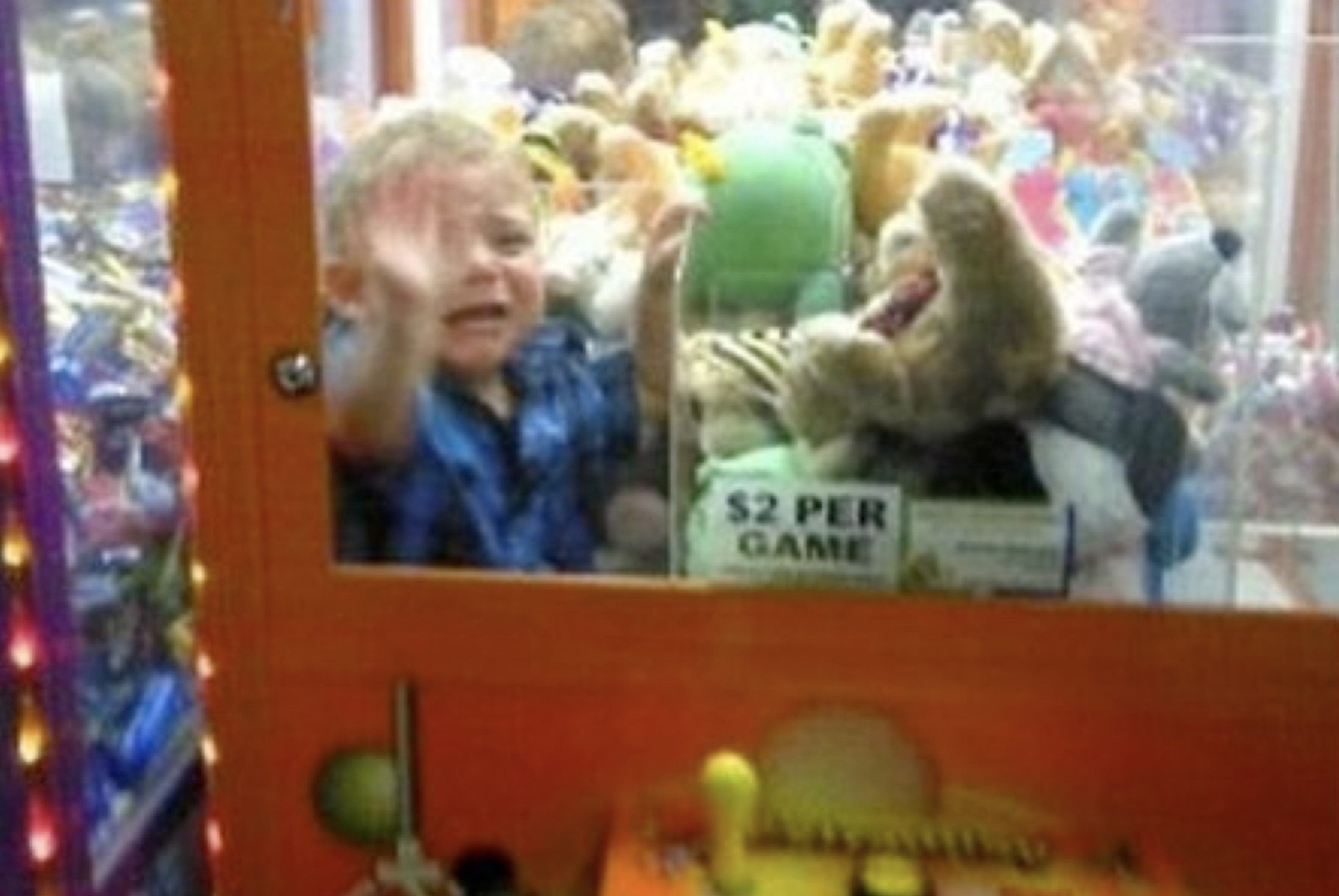 kid stuck in a claw machine - $2 Per Game P