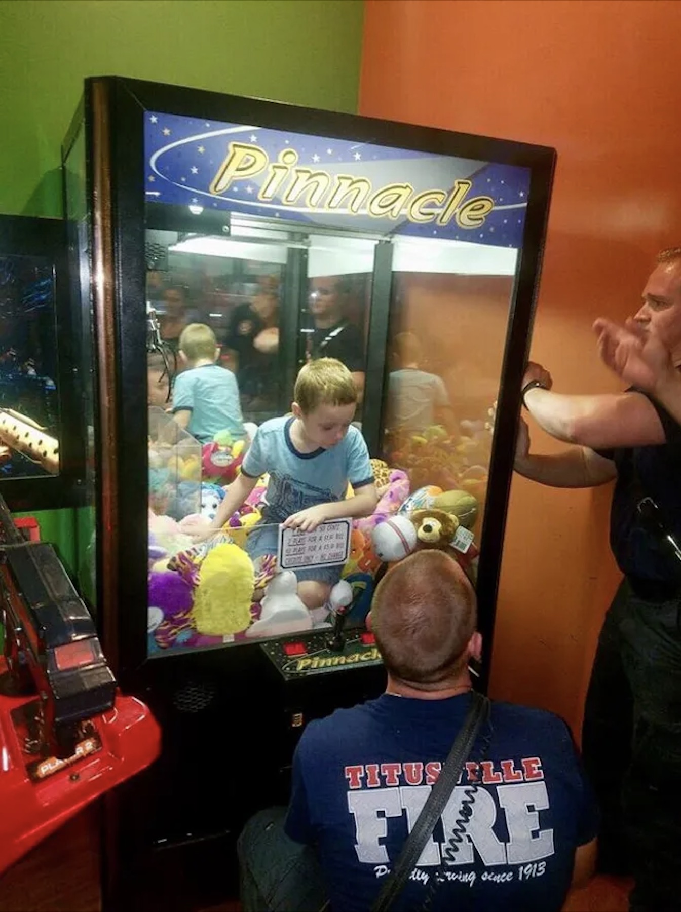 kid stuck in claw machine - Pinnacle St One Luble For A Sure Wi Szert For A As Bu Pinnach Titus Elle Re Myrving since 1913