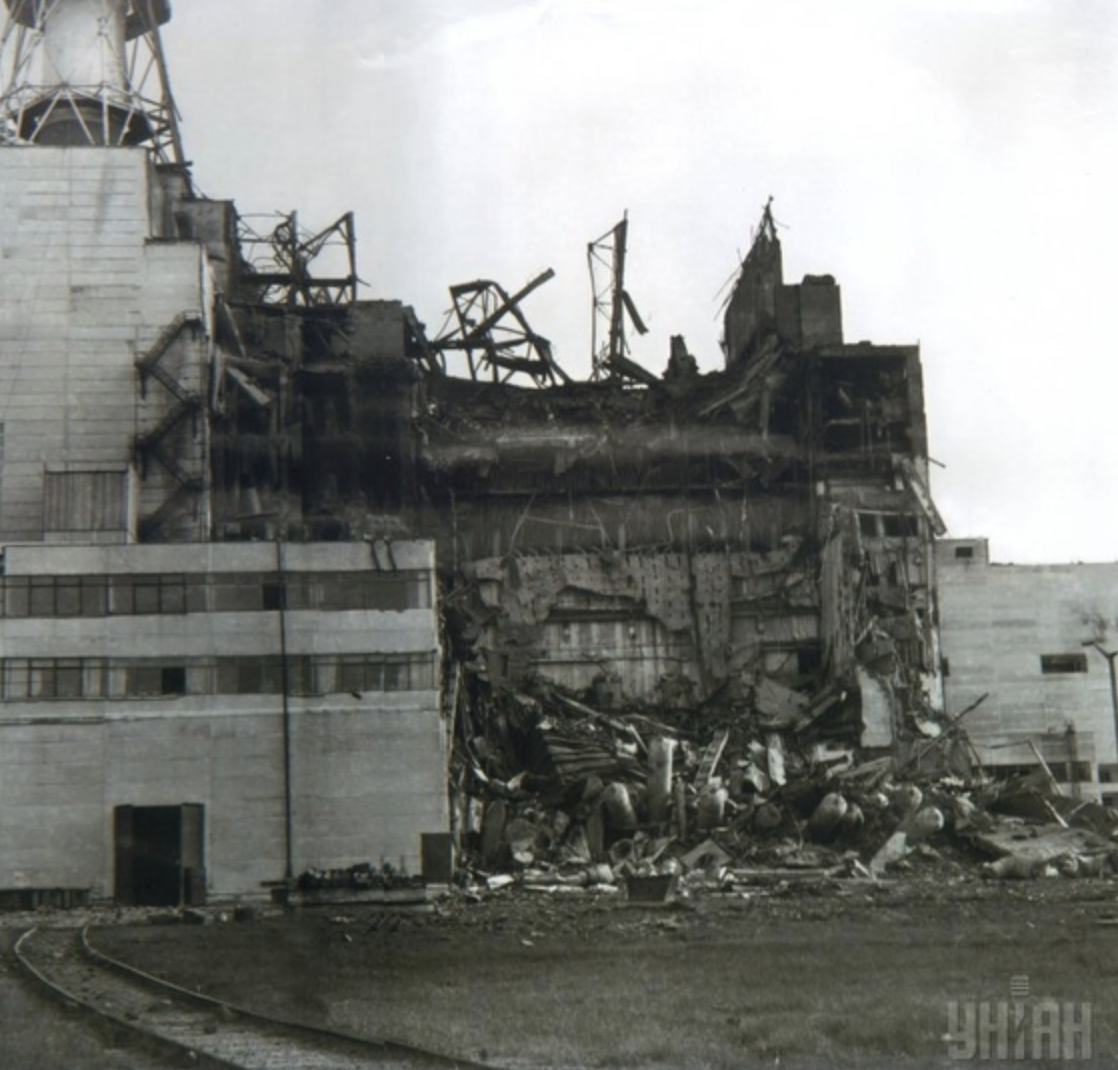 The earliest known photo of the Chernobyl disaster, taken by the power plant's photographer, dawn of April 26th, 1986.