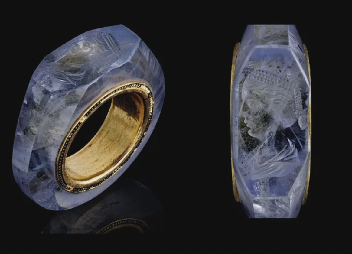 An engraved sapphire hololith, meaning a ring carved from a single stone, with a gold band mounted on the inside, likely during the Middle Ages. It might have to have belonged to Roman emperor Caligula, with the engraving representing Caligula’s wife Caesonia.