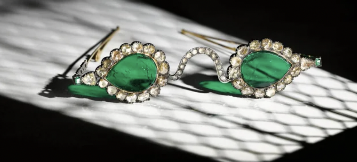 A pair of Mughal spectacles set with emerald lenses and diamond-mounted frames, lenses circa 17th century, frames 19th century.