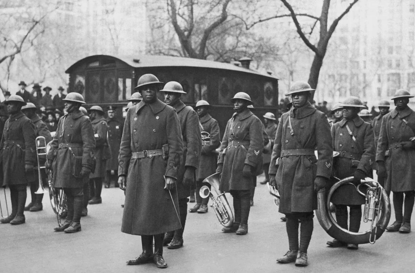 Lt. James Reese Europe and members of his 369th Infantry Regiment jazz band participate in a parade upon their return to the United States from Europe, 1919.