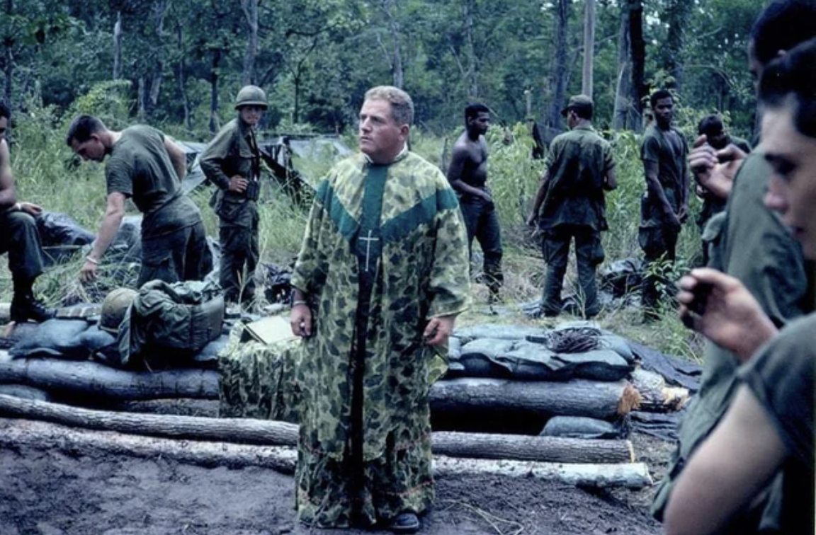 A priest wearing a camouflage cassock in Vietnam, 1968.