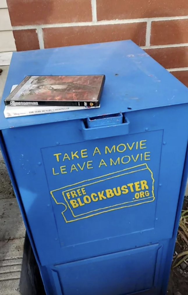 signage - Take A Movie Leave A Movie Free Blockbuster .Org