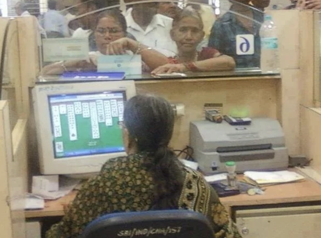 bank employee playing cards