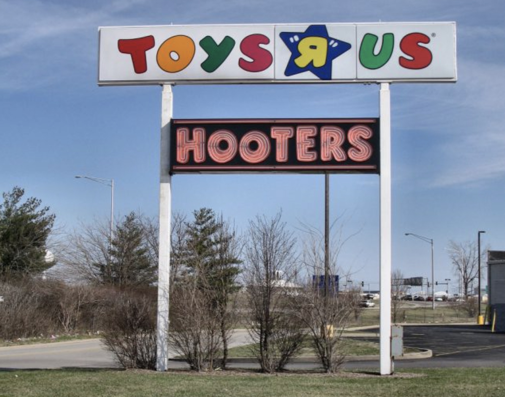 street sign - Toys Us Hooters