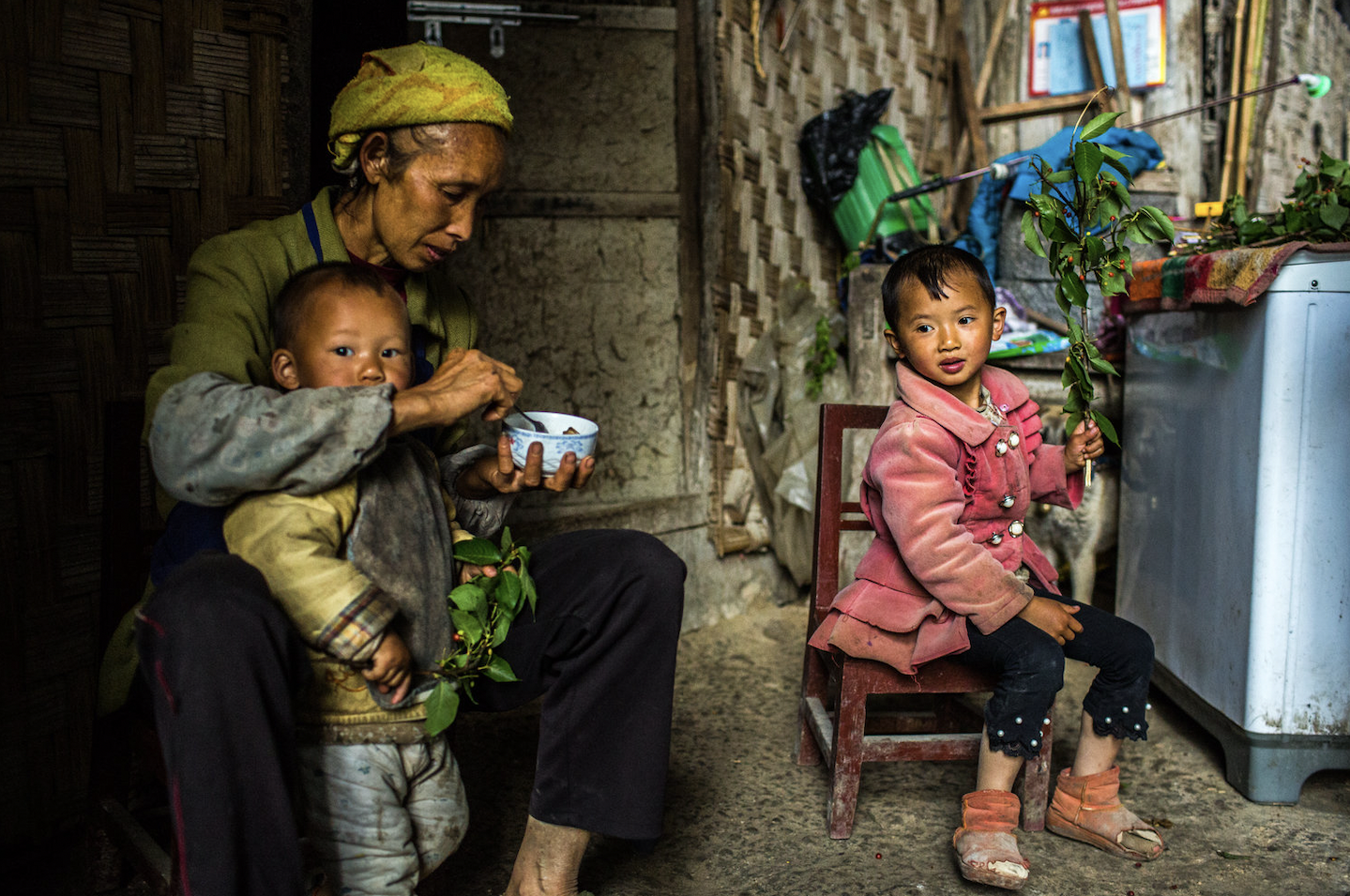 A child returns home after a week at boarding school. As is the case in many communities in rural China, many children spend significant time away from home at school.