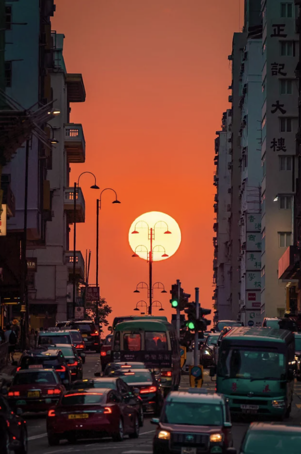 “Took a picture of a sunset henge in Hong Kong.”