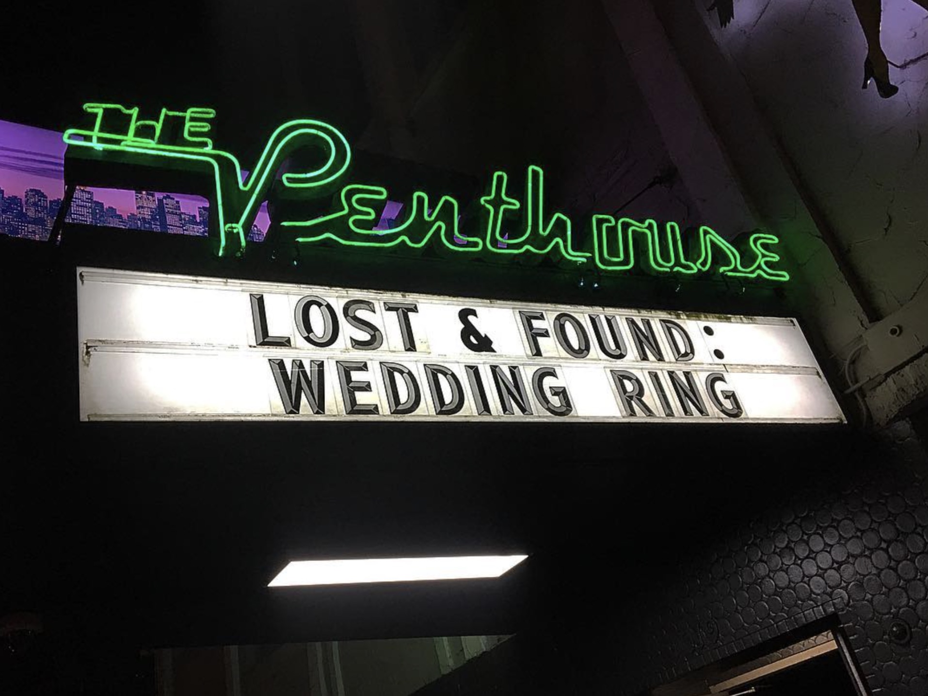 neon sign - The Penthouse Lost & Found Wedding Ring