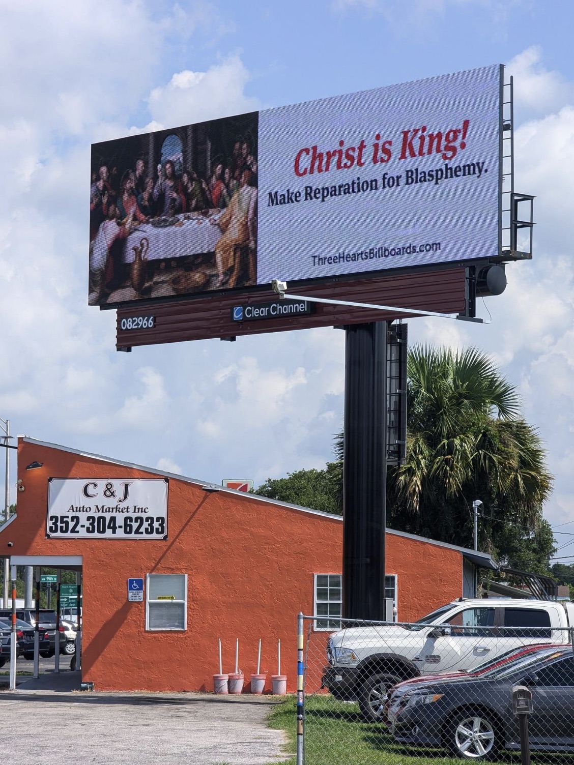 billboard - Christ is King! Make Reparation for Blasphemy. ThreeHeartsBillboards.com 062966 Clear Channel C&J Auto Market Inc 3523046233