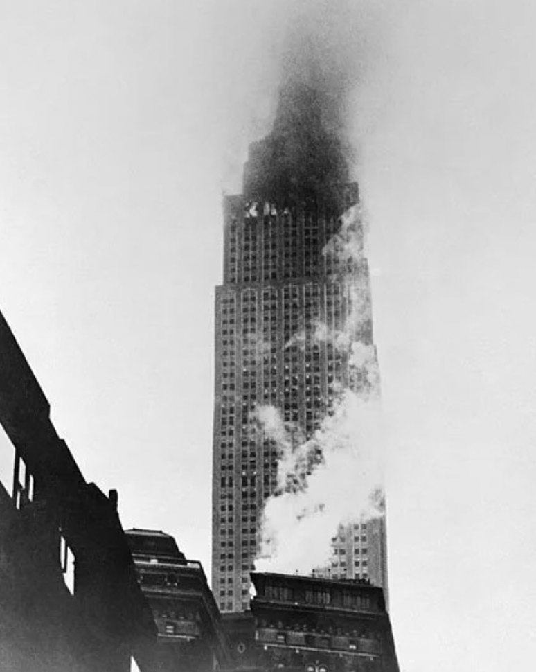 One of the engines flew through the building and ended up falling 900 feet, through the roof of a penthouse on 33rd St, causing a fire. These flames are actually from that fire. 