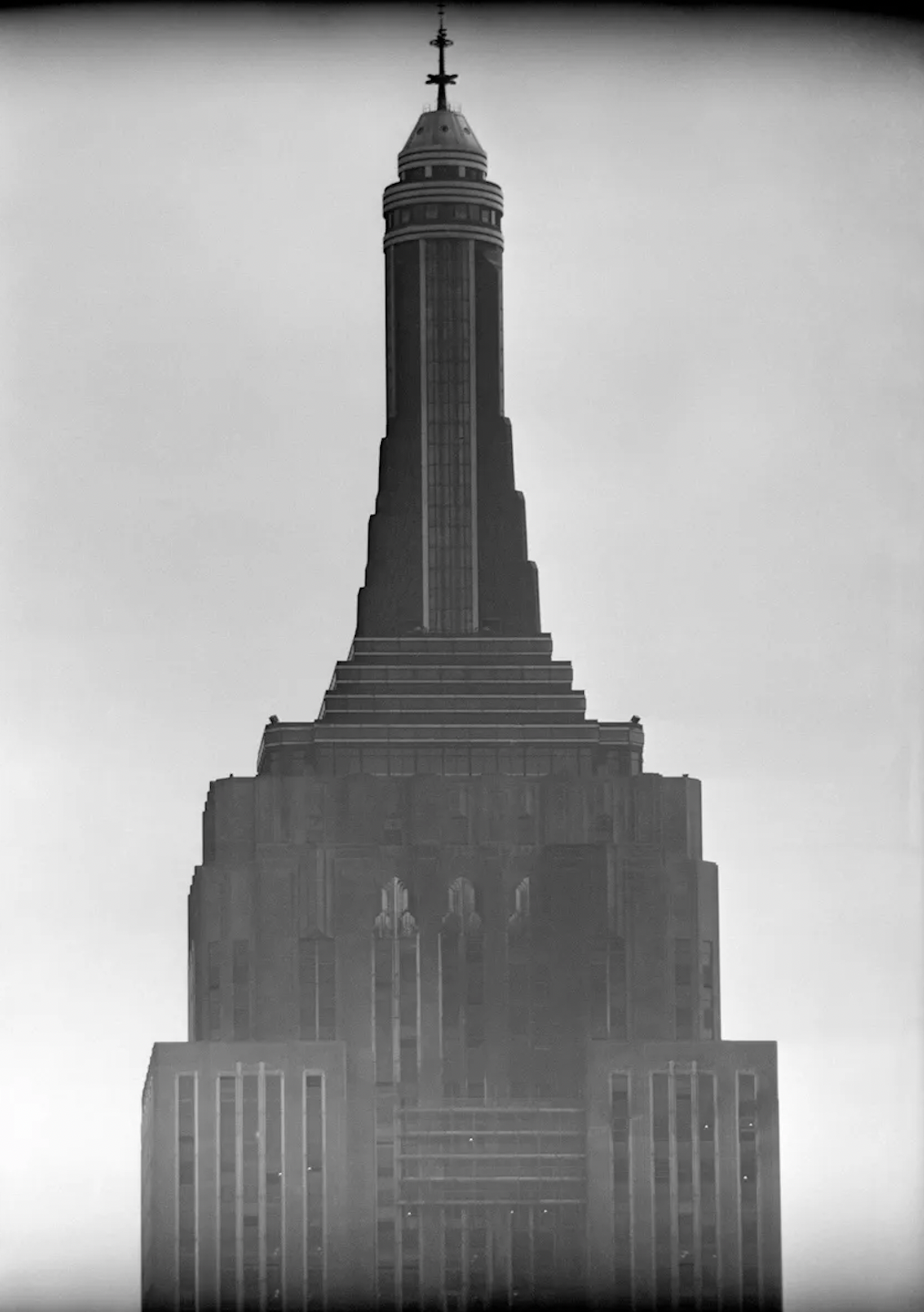 The damage to the facade of the building. 