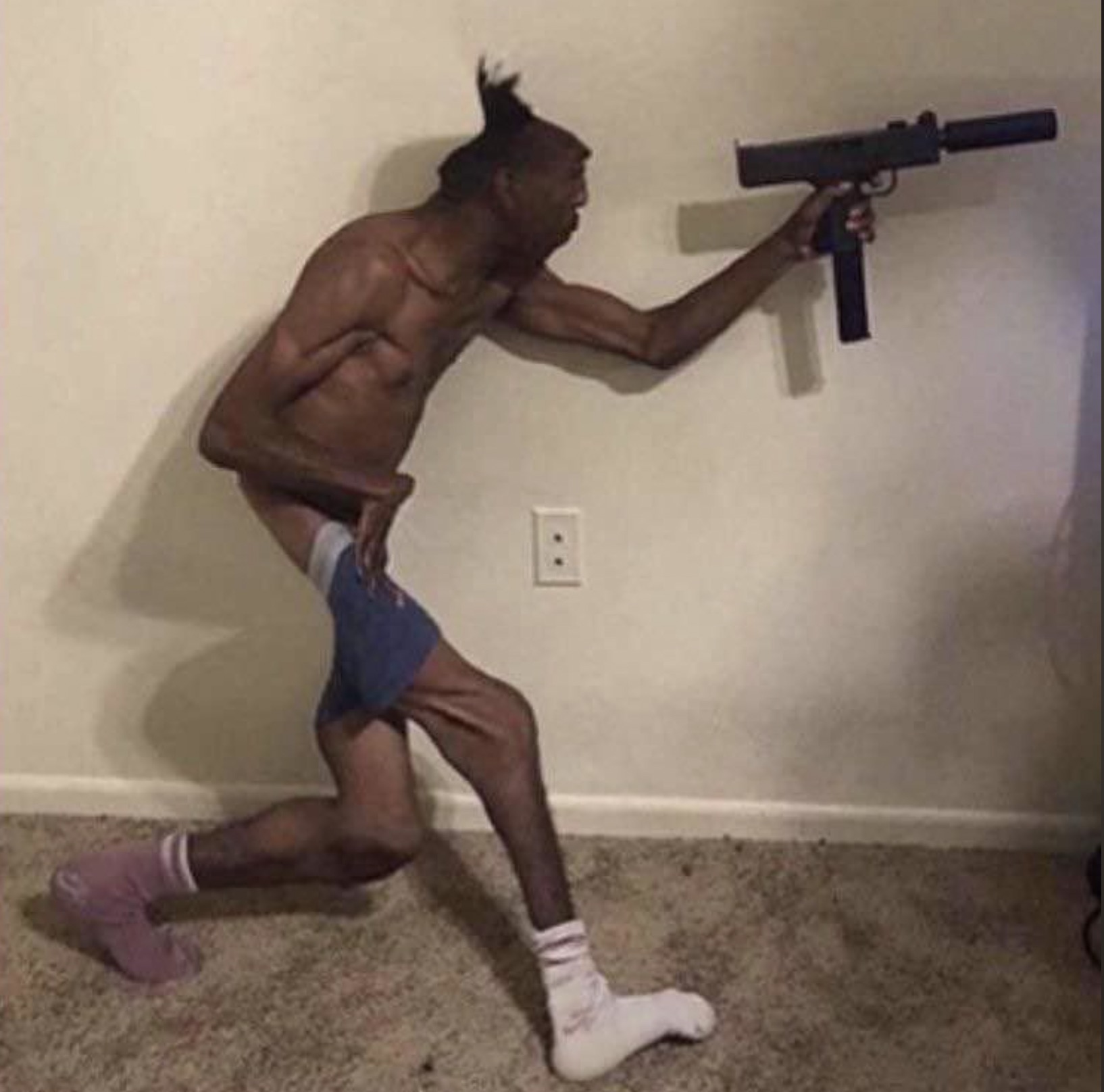 black man with uzi - B