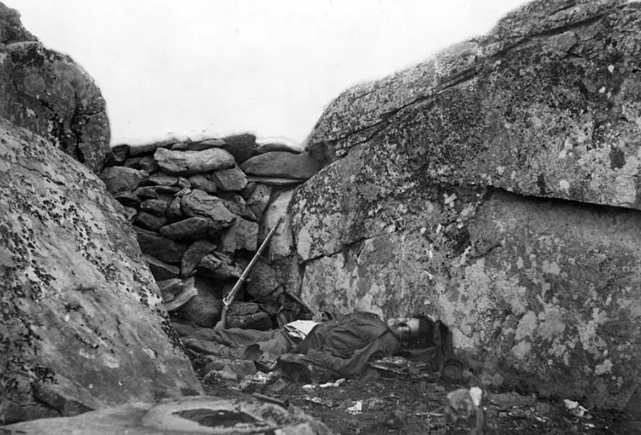 Alexander Gardner has two photos titled “A Sharpshooter’s Last Sleep” and “Home of a Rebel Sharpshooter.” The body in each photo looks suspiciously similar, and many experts believe he dragged the body more than 40 yards to use it in each photo.