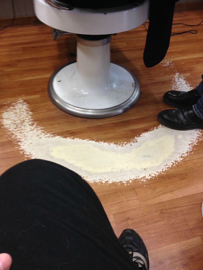 How many haircuts do you think it takes to wear down the floor of a barber shop like this?