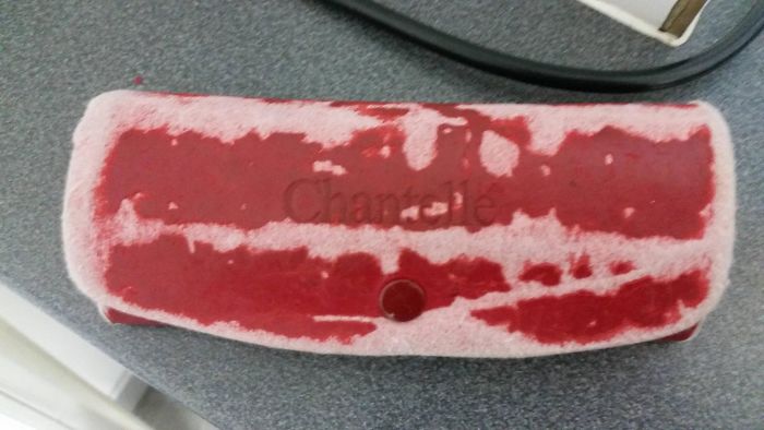 A leather glasses case has turned into a slice of bacon over the years.