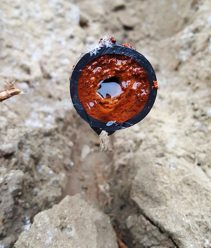 Years of mineral deposit and rust build up in this pipe.