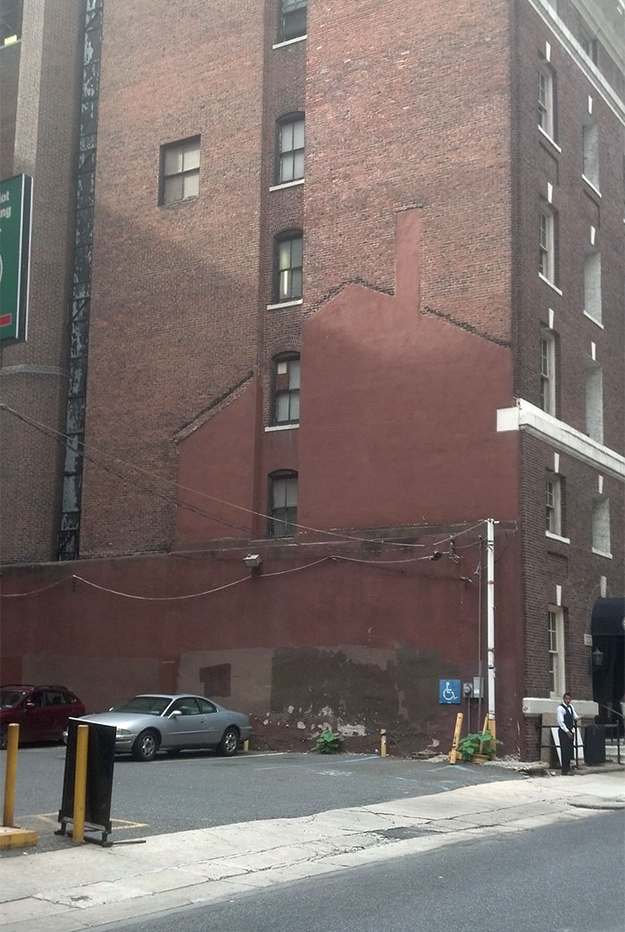 The ghostly remains of an older house that is no longer standing.