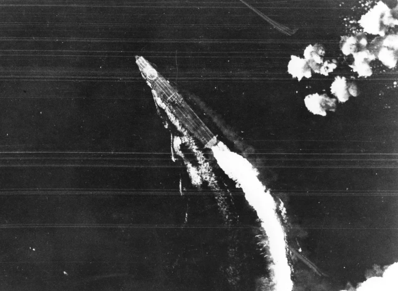 Japanese carrier Hiryu swerves to avoid bombs dropped by B-17s during the Battle of Midway, 4 June 1942.