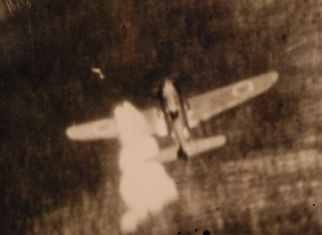 Japanese Mitsubishi A6M “Zero” aircraft being attacked by a Grumman F6F “Hellcat” during action in the Pacific. Photograph was taken by a gun camera installed in the leading edge of the plane wing and attuned to plane machine-guns and cannon.