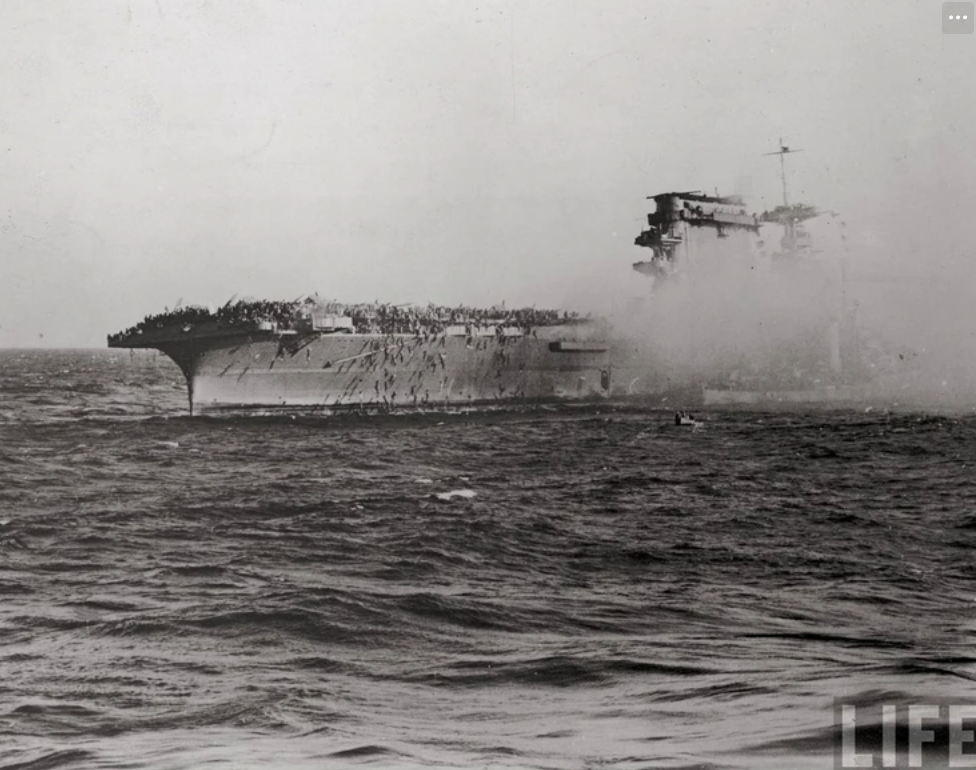 Sailors abandoning the doomed USS Lexington. Battle of the Coral Sea. 1942.