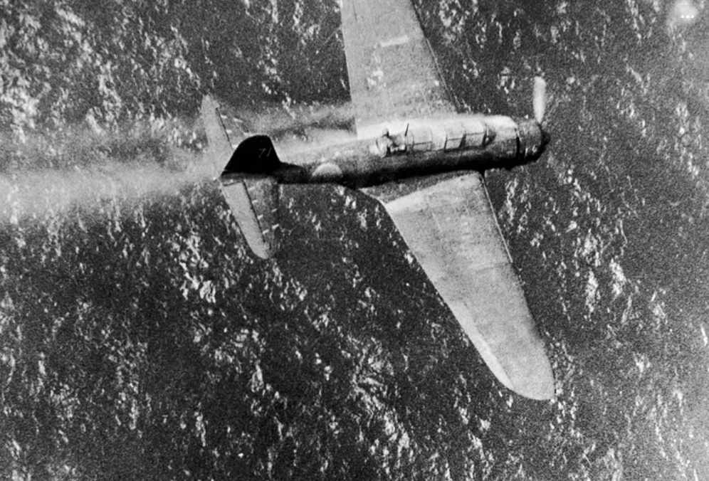 Japanese dive bomber heading for destruction in the Pacific, 1944.