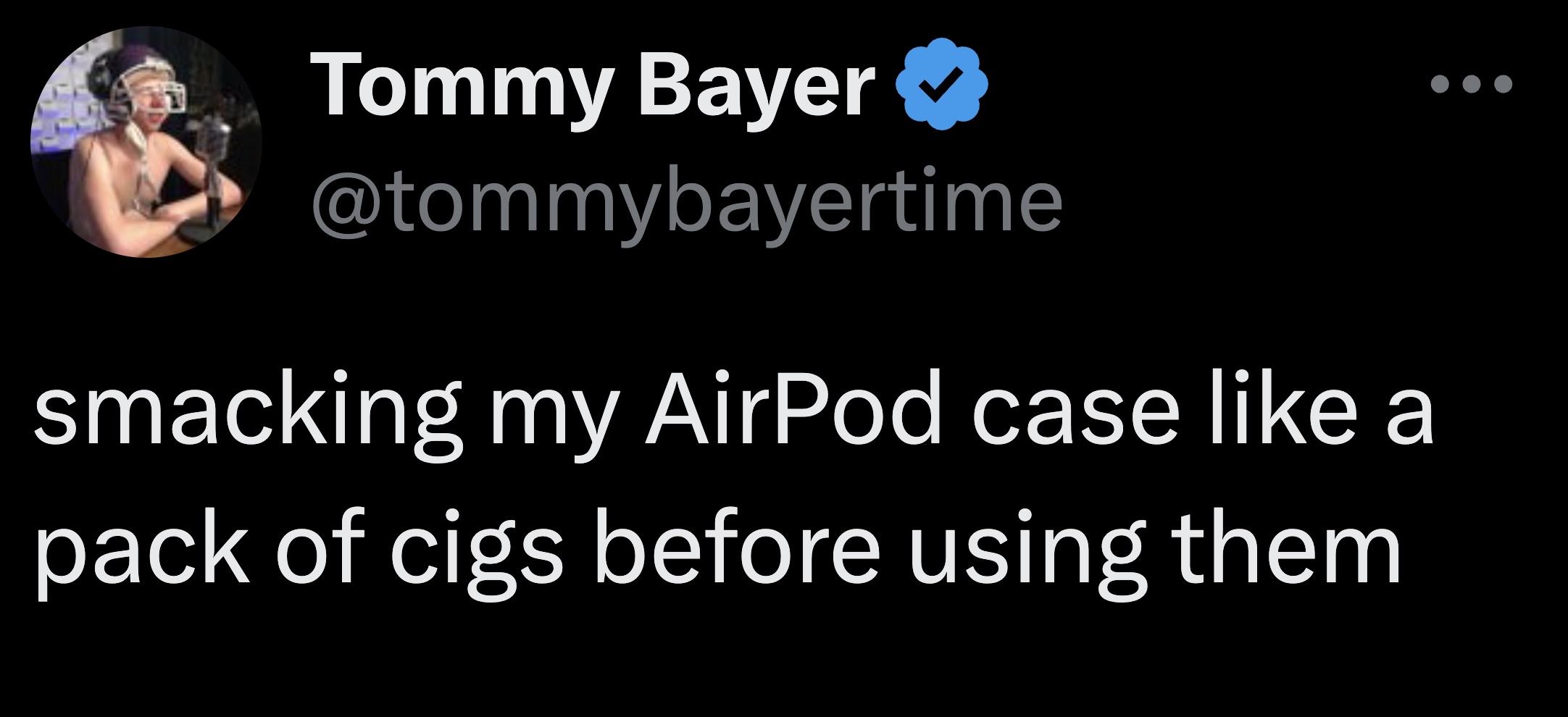 screenshot - Tommy Bayer smacking my AirPod case a pack of cigs before using them