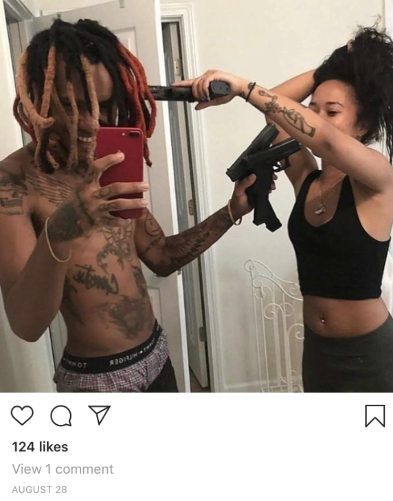 Nothing says “true love” like pointing guns at each others’ heads.