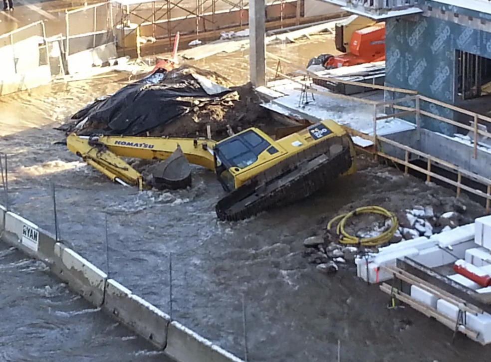 “Excavator at a construction site got a bit of water damage last night.”