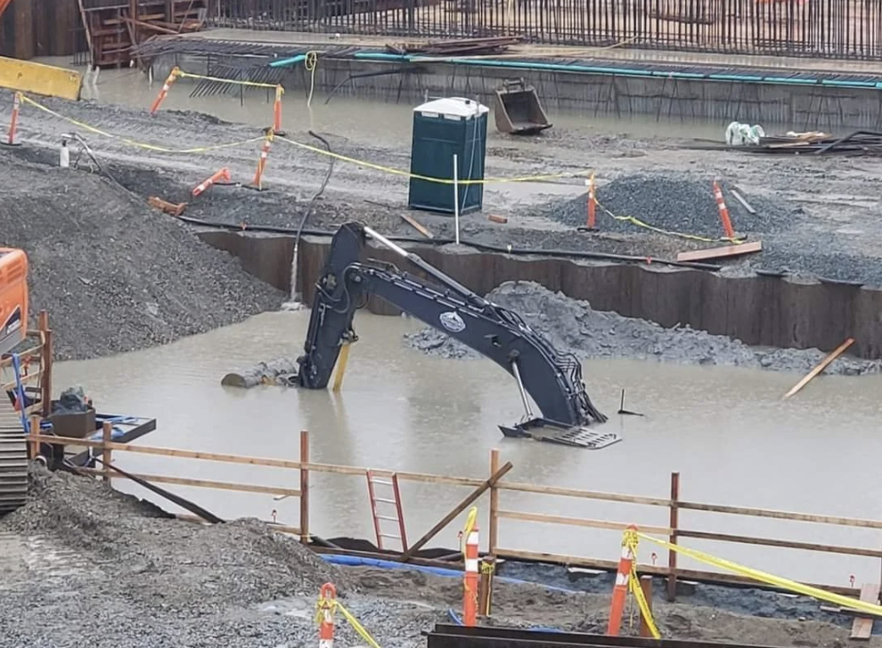 Digging into a water main. Minneapolis.