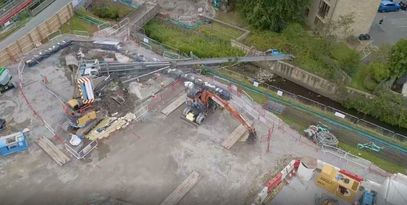 Piling rig toppled over. Damaged a crane, (removed), and landed on a digger with a man inside both machines.