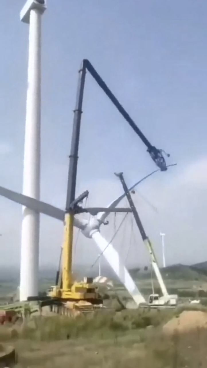 Crane drops a wind turbine. 