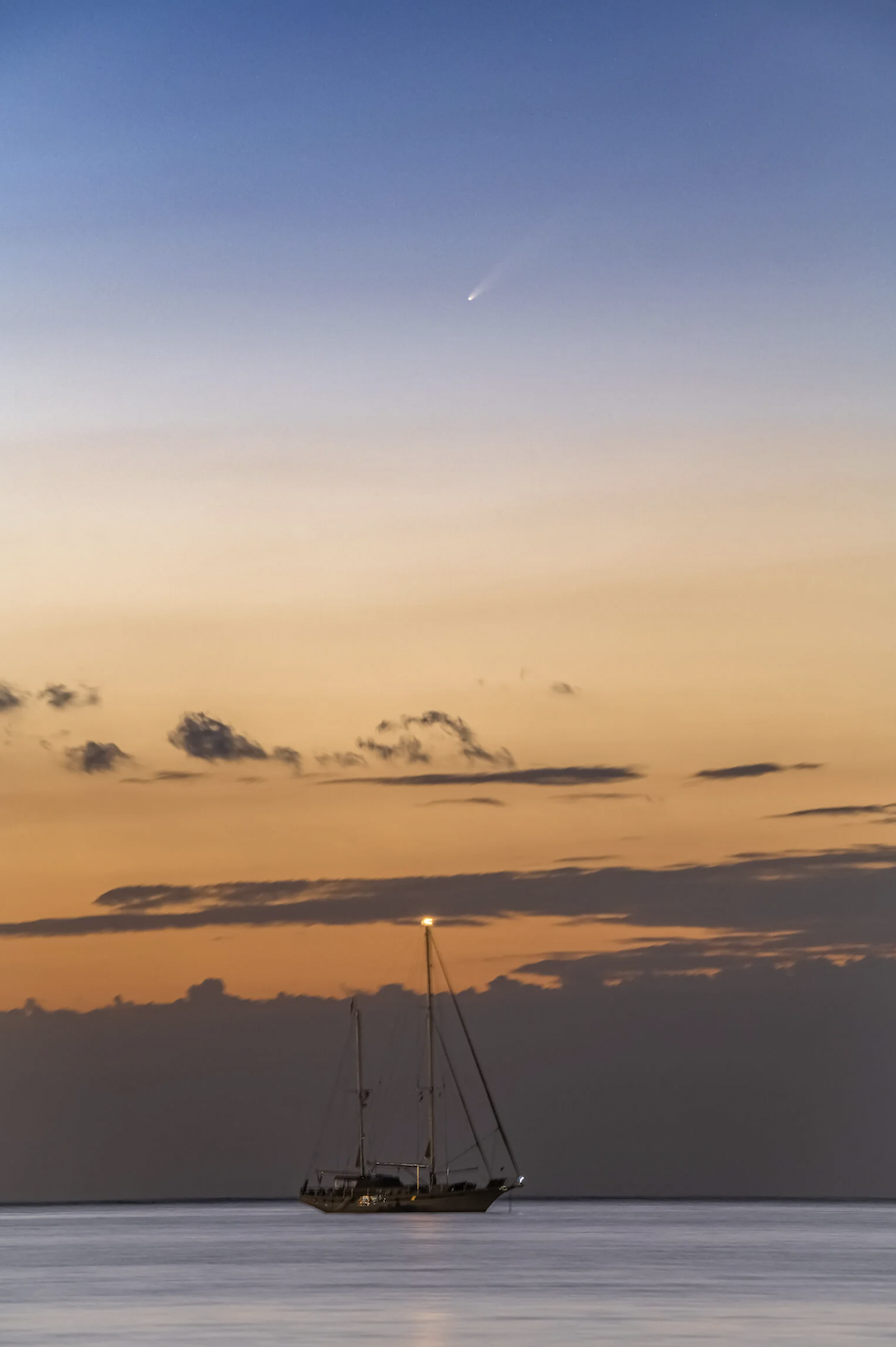 A ketch at anchor outside of Syracuse on the Sicilian coast.