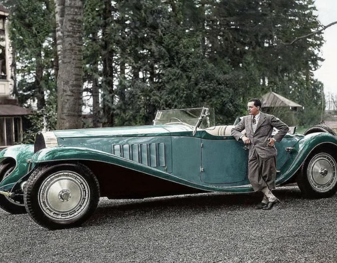 Jean Bugatti standing next to his Bugatti Royale, one of seven built. 1932.