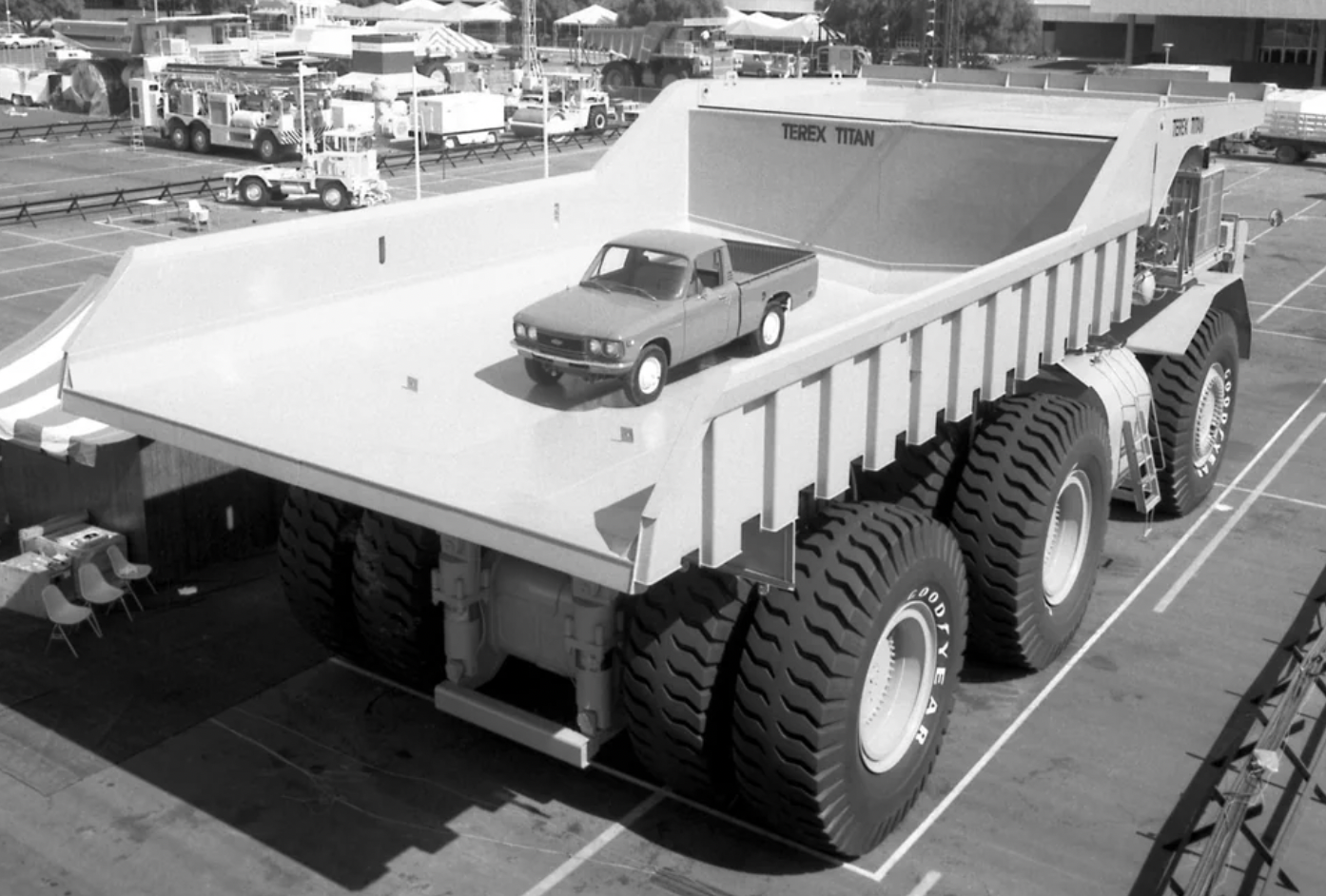 1973 Terex 33-19 Titan dump truck with a pickup truck in the bed. It had a 169L V-16 diesel engine and weighed in at 1,209,500 lbs.