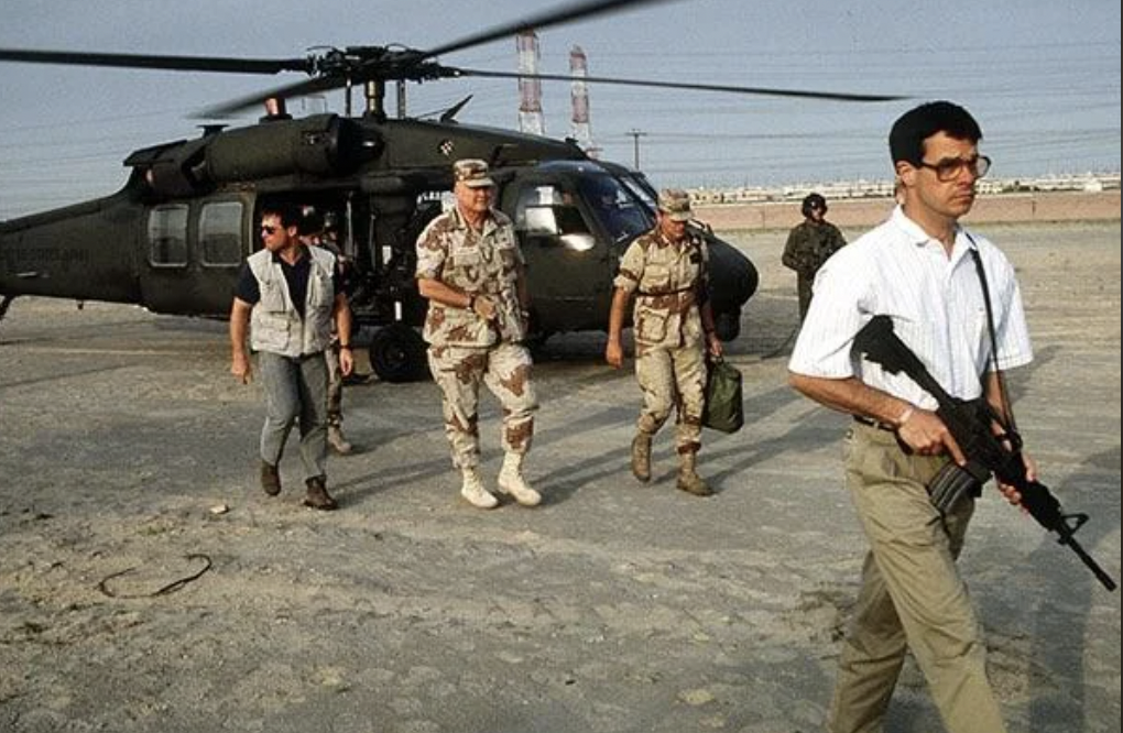 USA Delta Force in casual attire protecting General Norman Schwarzkopf during the Gulf War, 1991. Mike Vining leads the way.