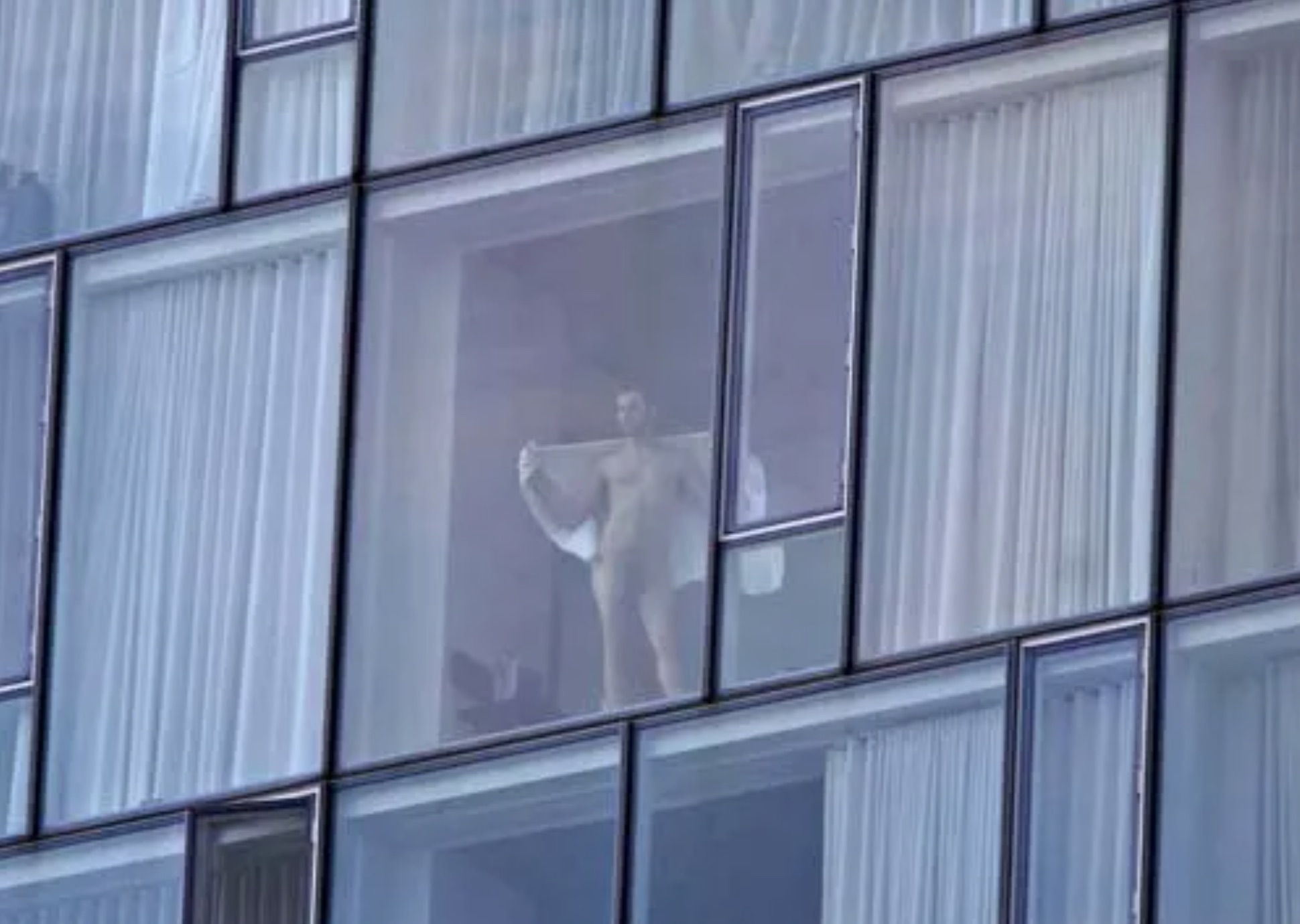 naked hotel window