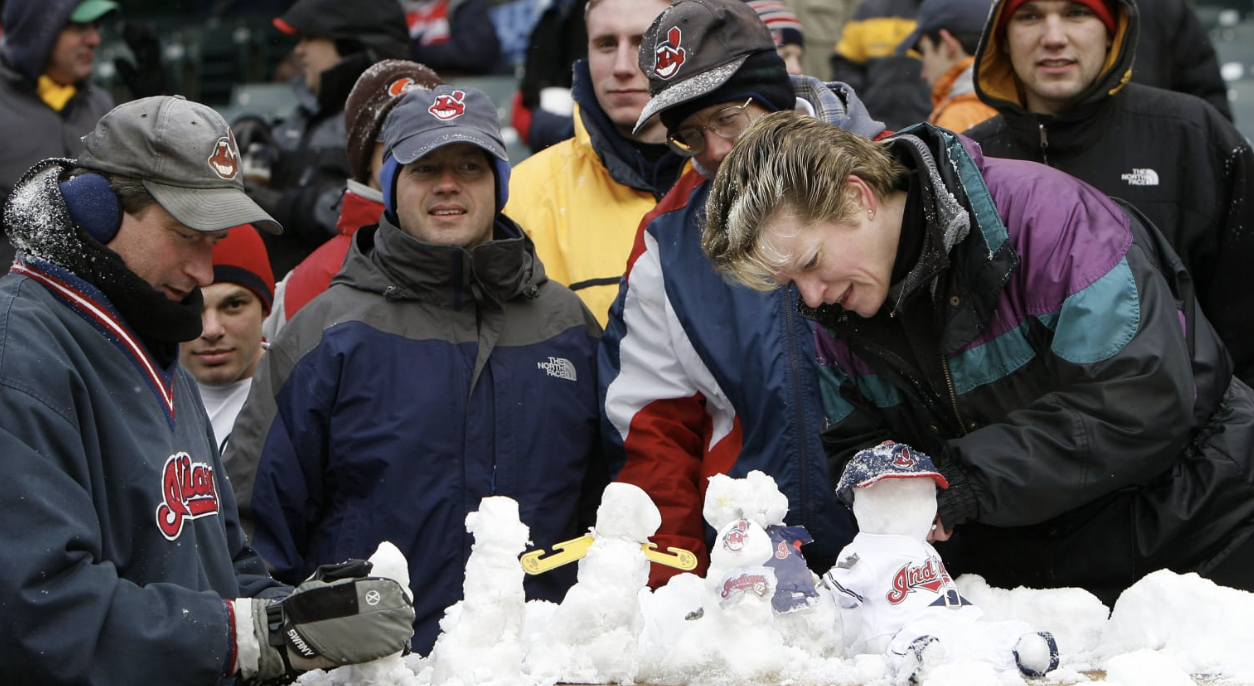 Cleveland fans build snowmen as their 2007 season opener is delayed.