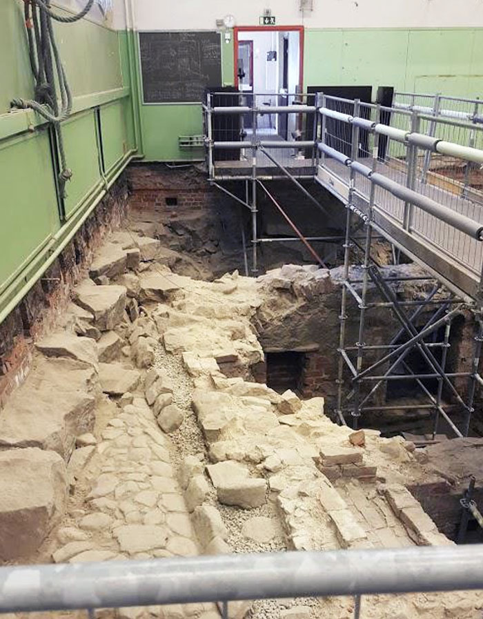 This school in Finland was founded in  1276 and it was discovered there were Medieval Ruins underneath it.