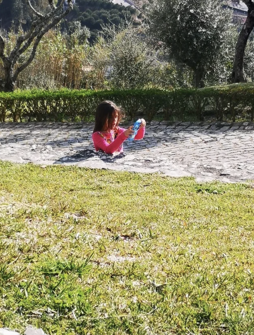 girl stuck in concrete or behind wall