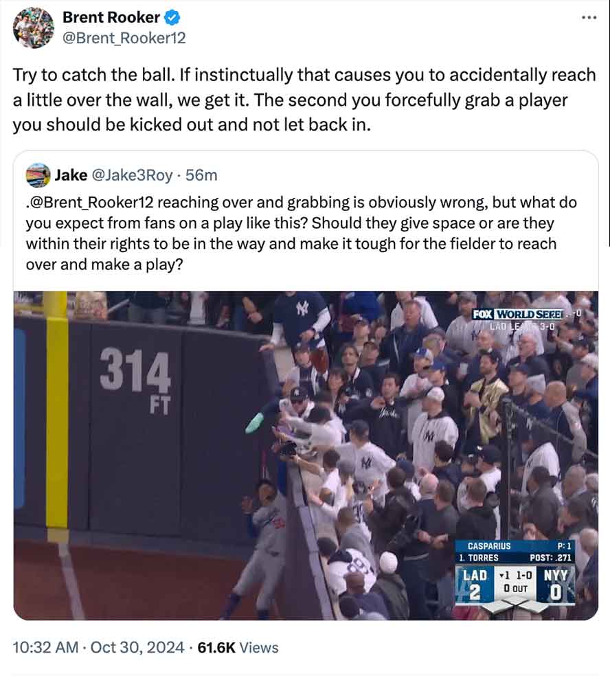 crowd - Brent Rooker Rooker12 Try to catch the ball. If instinctually that causes you to accidentally reach a little over the wall, we get it. The second you forcefully grab a player you should be kicked out and not let back in. Jake 56m . reaching over a