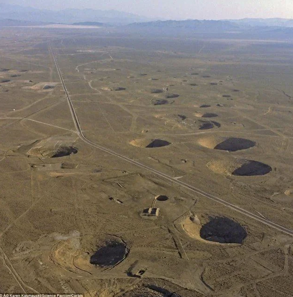 Huge craters scar the Nevada desert from nuclear tests in the 1950’s and later years.