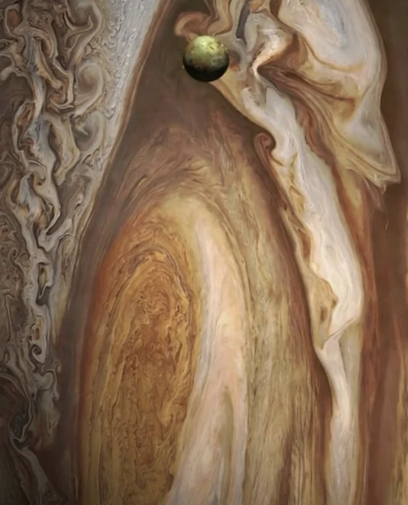 Jupiter and its fifth moon, Io.