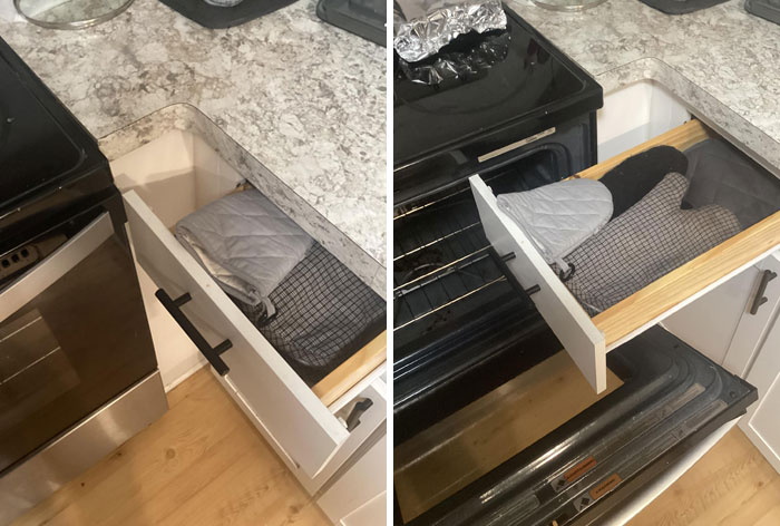 You have to open the oven door to fully open this drawer.