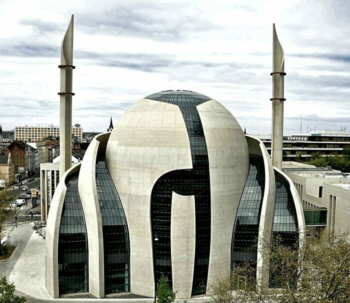 The Central Mosque located in Cologne, Germany, sort of resembles a piece of Mandalorian armor / the helmet.