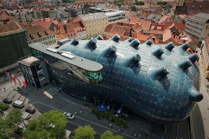 This giant spikey pickle looking building is actually the Graz Art Museum in Graz, Austria.