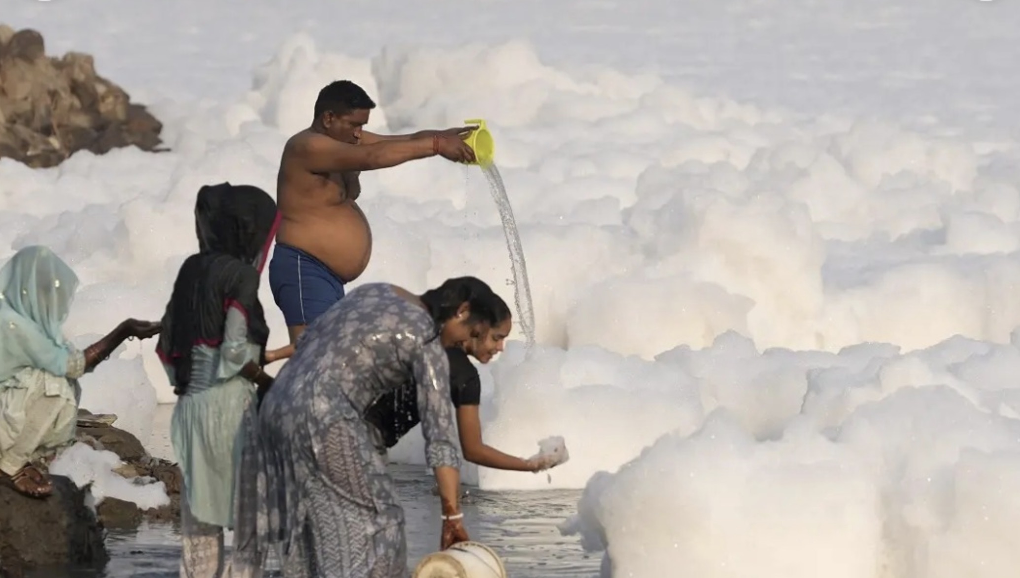 foam on yamuna river